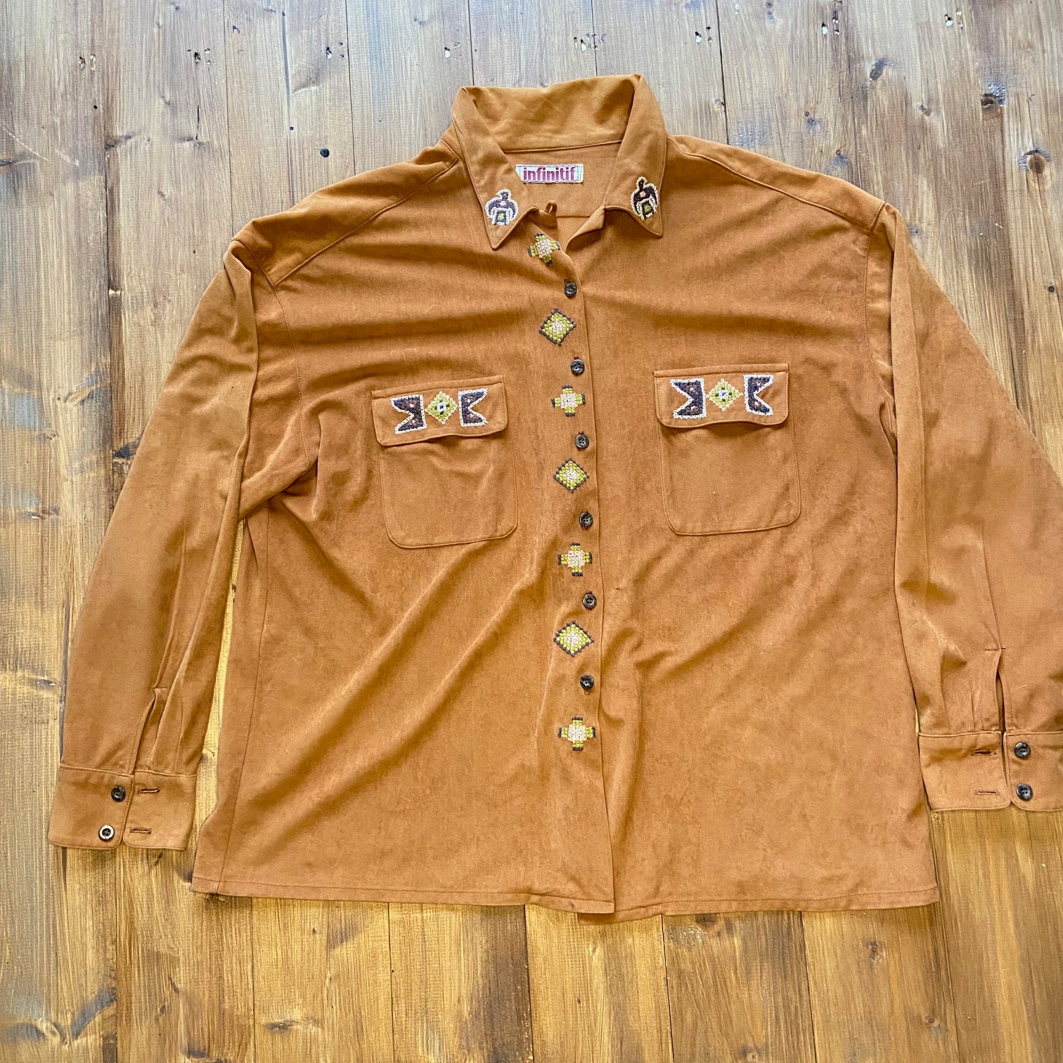 Brown sued shirt with aztec embroidery